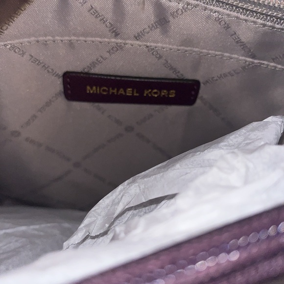 Brand new dark purple Michael Kors purse! Buttons at the top. Divides in center - Picture 4 of 6
